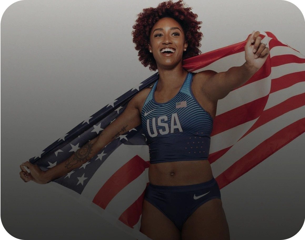Brianna McNeal, Olympic gold medal hurdler, holding the Hume Pod sensor bar